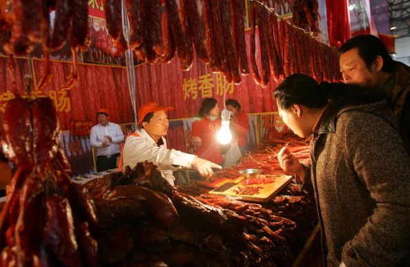Китайцы делают предновогодние покупки. Фото: Getty Images