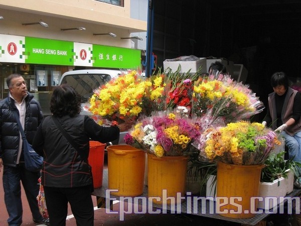 Новогодние цветы на гонконгском цветочном рынке Гонконга. 2010 год. Фото: The Epoch Times
