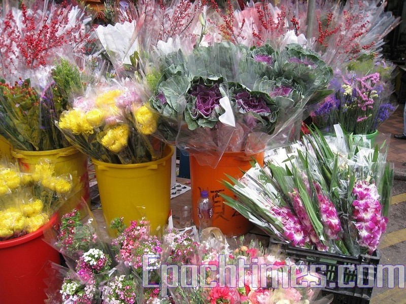 Новогодние цветы на гонконгском цветочном рынке Гонконга. 2010 год. Фото: The Epoch Times