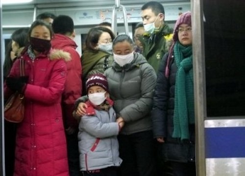 В пекинском метро. Декабрь 2013 года. Фото с epochtimes.com