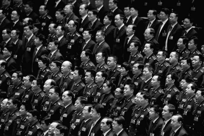 Китайские чиновники в 2012 году. Фото: Feng Li/Getty Images