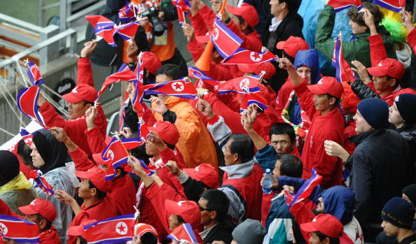 Португалия – КНДР. Фото: Vincenzo PINTO, Hoang DINH NAM, Lars BARON, /AFP/Getty Images