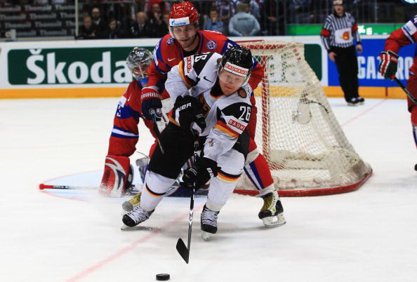 Россия - Германия. Фото: Martin ROSE, Alexander NEMENOV, Joe KLAMAR/Bongarts/Getty Images