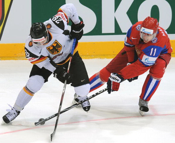 Россия - Германия. Фото: Martin ROSE, Alexander NEMENOV, Joe KLAMAR/Bongarts/Getty Images