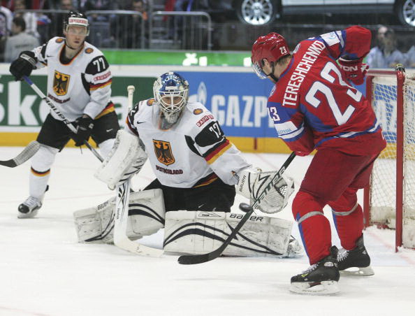 Россия - Германия. Фото: Martin ROSE, Alexander NEMENOV, Joe KLAMAR/Bongarts/Getty Images