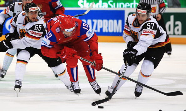 Россия - Германия. Фото: Martin ROSE, Alexander NEMENOV, Joe KLAMAR/Bongarts/Getty Images