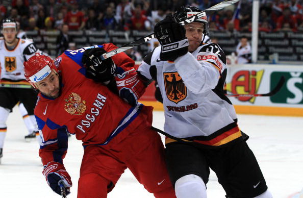 Россия - Германия. Фото: Martin ROSE, Alexander NEMENOV, Joe KLAMAR/Bongarts/Getty Images