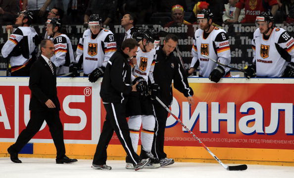 Россия - Германия. Фото: Martin ROSE, Alexander NEMENOV, Joe KLAMAR/Bongarts/Getty Images