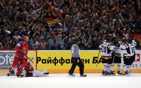 Россия - Германия. Фото: Martin ROSE, Alexander NEMENOV, Joe KLAMAR/Bongarts/Getty Images