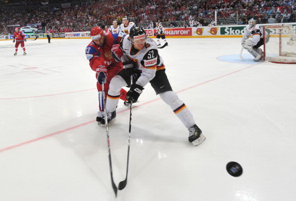Россия - Германия. Фото: Martin ROSE, Alexander NEMENOV, Joe KLAMAR/Bongarts/Getty Images