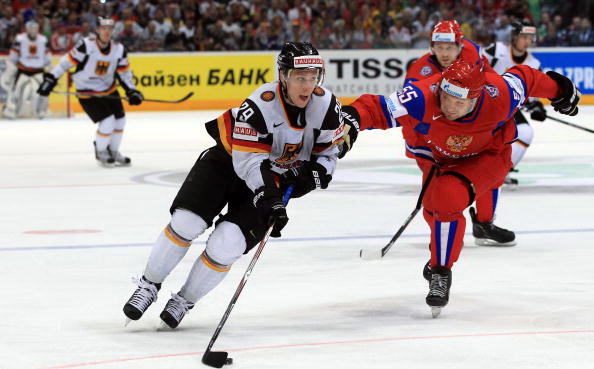 Россия - Германия. Фото: Martin ROSE, Alexander NEMENOV, Joe KLAMAR/Bongarts/Getty Images