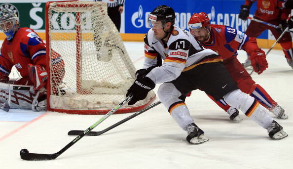 Россия - Германия. Фото: Martin ROSE, Alexander NEMENOV, Joe KLAMAR/Bongarts/Getty Images