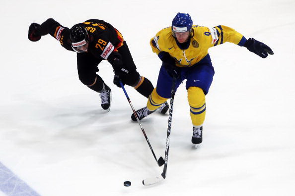 Швеция – Германия. Фото: Lars BARON, Martin ROSE, Joe KLAMAR, Juergen SCHWARZ, Alexander NEMENOV/Bongarts/Getty Images