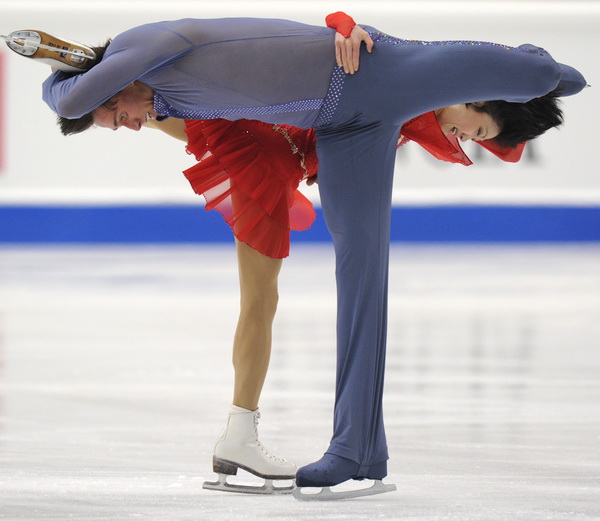 Юко Кавагути и Александр Смирнов. Фото: Yuri KADOBNOV/AFP/Getty Images