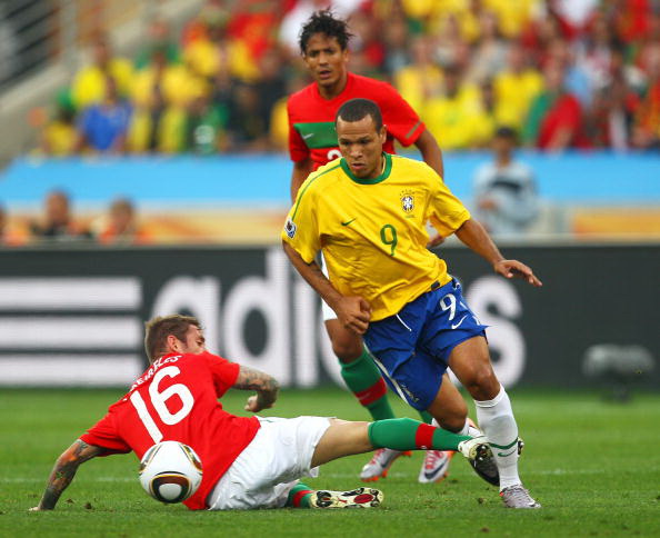 Португалия – Бразилия. Фото: Lars BARON. Liu JIN, Steve HAAG, Richard HEATHCOTE, Carl DE SOUZA, Anyonio SCORZA, Jamie McDONALD, Karim JAAFAR /AFP/Getty Images