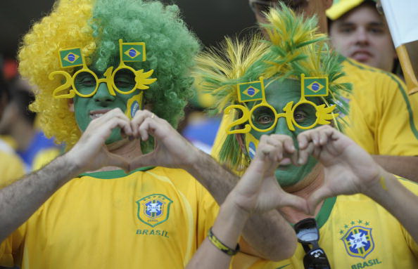 Португалия – Бразилия. Фото: Lars BARON. Liu JIN, Steve HAAG, Richard HEATHCOTE, Carl DE SOUZA, Anyonio SCORZA, Jamie McDONALD, Karim JAAFAR /AFP/Getty Images