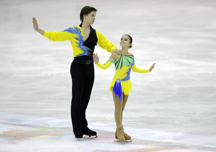 Российские фигуристы Лина Федорова и Максим Мирошкин на юниорском Чемпионате мира в Милане 27 февраля 2013 года. Фото: Claudio Villa/Getty Images
