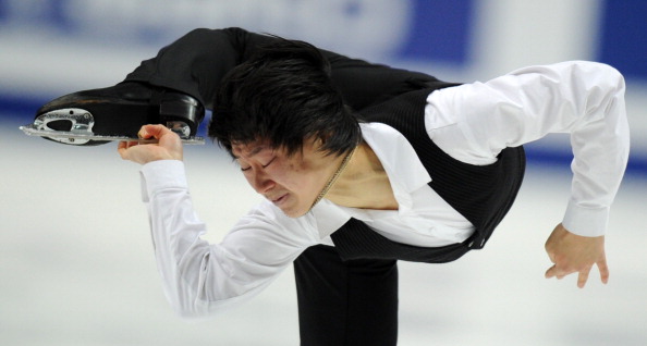 ЧМ по фигурному катанию.  Мужская короткая программа.  Фото:  ALEXANDER NEMENOV/YURI KADOBNOV/AFP/Getty Images