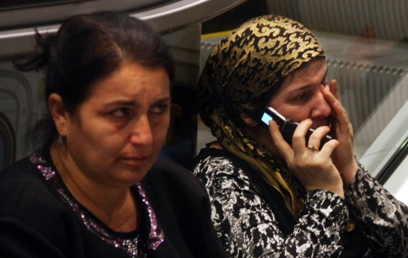 Авария самолета в «Домодедово»: пассажиры с Ту-154  доставлены в Махачкалу; открыты горячие линии.  фоторепортаж. Фото: ANDREY SMIRNOV/AFP/Getty Images