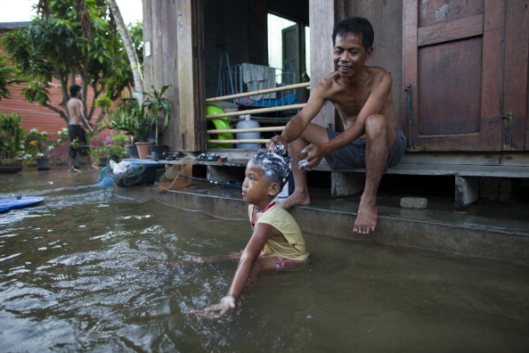 Фоторепортаж о наводнении в Таиланде.Фото:Paula Bronstein /Getty Images 