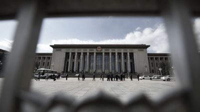 Большой народный зал в Пекине, где китайский законодательный орган проводит свои сессии. Фото: Greg Baker/ AFP Getty Images)