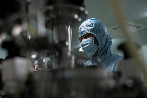 Исследование COVID-19 в лаборатории компании Yisheng Biopharma в Шэньяне, провинция Ляонин, Китай, 10 июня 2020 года. NOEL CELIS/AFP via Getty Images