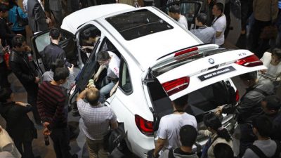 BMW X5 на автосалоне Auto China в Пекине в мае 2014 года. Фото: STR/AFP/Getty Images