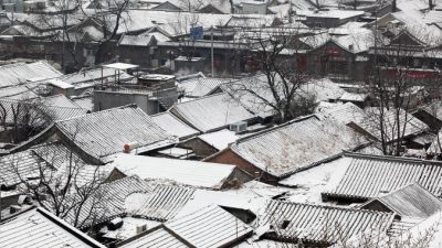 Покрытый снегом хутун в Пекине 10 февраля 2011 г. Фото: Feng Li/Getty Images