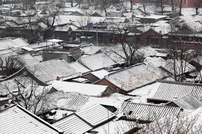 Покрытый снегом хутун в Пекине 10 февраля 2011 г. Фото: Feng Li/Getty Images