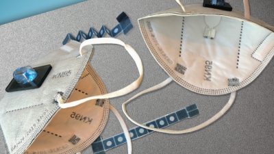 Инженеры Массачусетского технологического института и Гарварда разработали прототип маски для лица, который может диагностировать у человека, носящего маску, Covid-19 в течение примерно 90 минут. news.mit.edu/Felice Frankel and MIT News Office/ CC BY-NC-ND 3.0