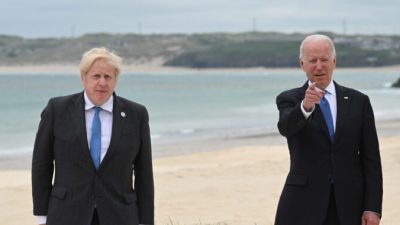 CARBIS BAY, CORNWALL - JUNE 11: Prime Minister of United Kingdom, Boris Johnson, and  US President Joe Biden pose during the Leaders official welcome and family photo during the G7 Summit In Carbis Bay, on June 11, 2021 in Carbis Bay, Cornwall. UK Prime Minister, Boris Johnson, hosts leaders from the USA, Japan, Germany, France, Italy and Canada at the G7 Summit. This year the UK has invited India, South Africa, and South Korea to attend the Leaders' Summit as guest countries as well as the EU. (Photo by Leon Neal - WPA Pool/Getty Images)