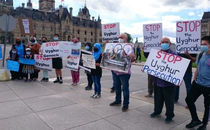 Митинг протеста против зимних Олимпийских игр 2022 года в Пекине на Парламентском холме в Оттаве 23 июня 2021 года Фото: NTD Television