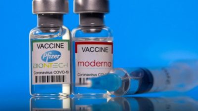Вакцины от Pfizer-BioNTech и Moderna от коронавируса (COVID-19), 19 марта 2021 г. (Dado Ruvic / Illustration / Reuters)