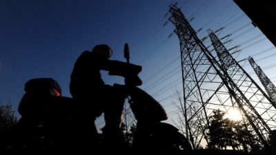 Государственный комитет по развитию и реформам Китая выпустил уведомление, в котором говорится о расширении диапазона цен на рынке энергетического угля. (FREDERIC J. BROWN/AFP/Getty Images)
