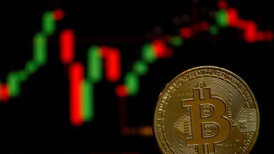 Изображение виртуальной криптовалюты биткойн, 14 июня 2021 года. (Edgar Su/Reuters)