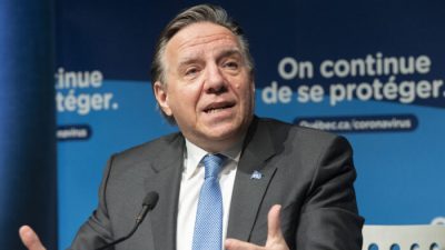 Премьер-министр Квебека Франсуа Лего выступает во время пресс-конференции в Монреале 30 декабря 2021 года. (Graham Hughes/The Canadian Press)
