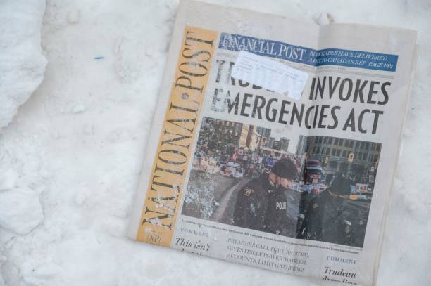 Журналисты The New York Times на время покинут Россию Первая страница газеты с изображением фотографа AFP Эда Джонса. Фото: ANDREJ IVANOV/AFP via Getty Images