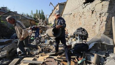 Разрушенные жилые дома в Мариуполе. Фото: ALEKSEY FILIPPOV/AFP via Getty Images