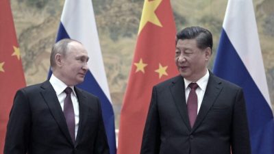 Президент России Владимир Путин (слева) и китайский лидер Си Цзиньпин во время встречи в Пекине 4 февраля 2022 года.(AlexeiDruzhinin/Sputnik/AFP viaGettyImages)