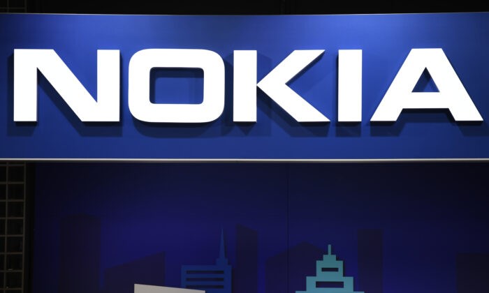 Логотип Nokia представлен на Всемирном мобильном конгрессе (MWC) в Барселоне, Испания, 25 февраля 2019 г. (Габриэль Буйс/AFP через Getty Images