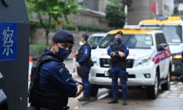 A special unit of the Hong Kong police provides security in the city's Wanchai district on June 30, 2022, as Chinese President Xi Jinping arrives in Hong Kong to attend celebrations marking the 25th anniversary of the city's handover from Britain to China. (Photo by Peter PARKS / AFP) (Photo by PETER PARKS/AFP via Getty Images)