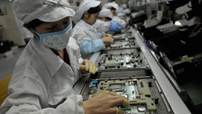 Массовые беспорядки начались на заводе Apple в Китае. (Photo credit should read AFP/AFP via Getty Images)