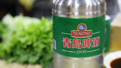 Китайское пиво Tsingtao. (Kentaro IEMOTO/flickr.com/CC BY-SA 2.0)